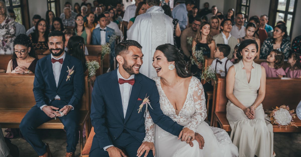 A joyful couple shares laughter during their wedding ceremony in San Ramon, Costa Rica.